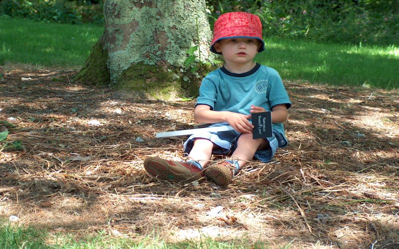 little boy in a summer hat